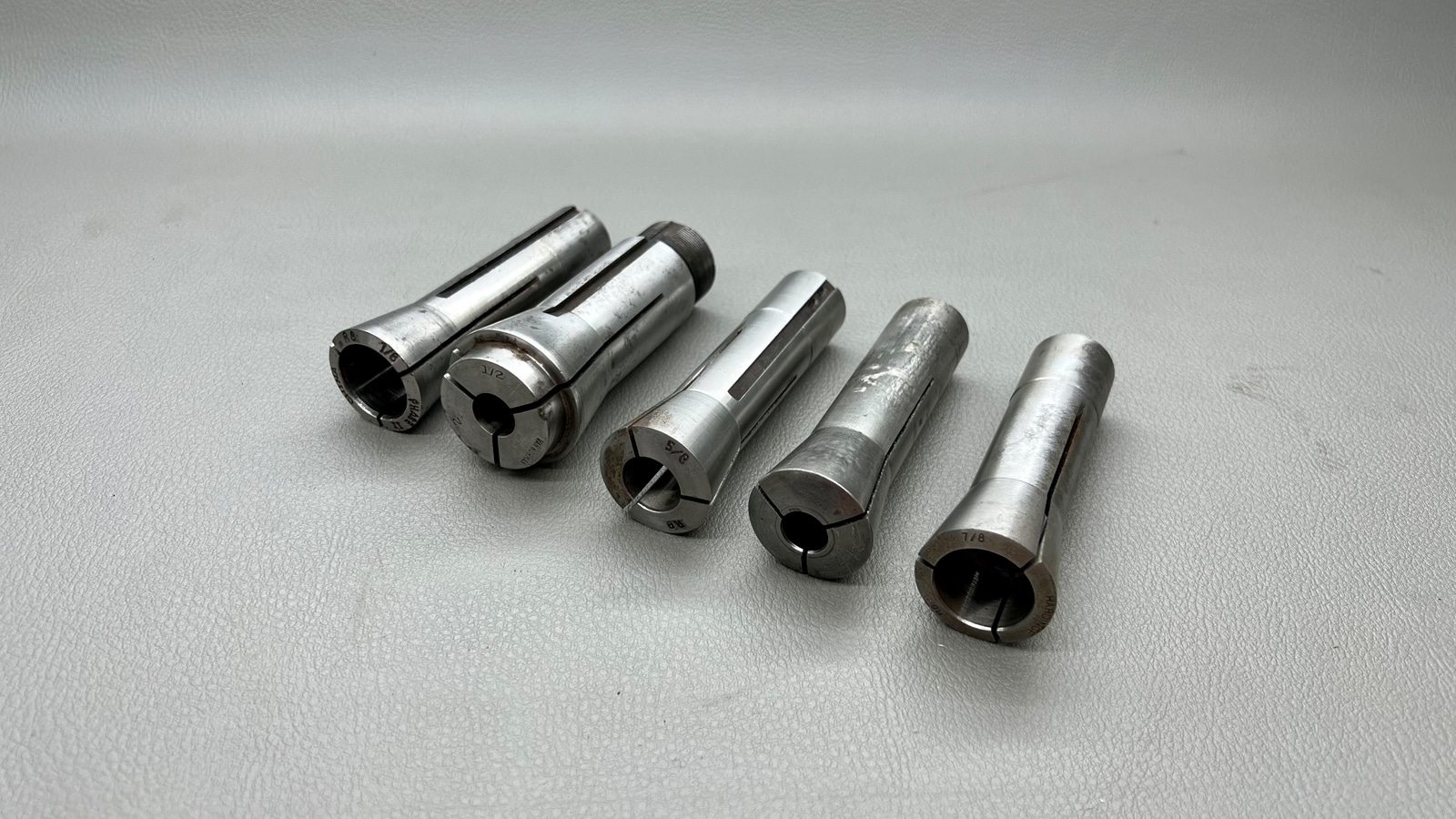 Five Large Assorted Collets Good Sizes 7/16, 5/8, 7/8, 7/8 these are R8, with the 1/2" Van Norman